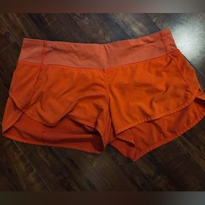 Lululemon size 8 orange shorts